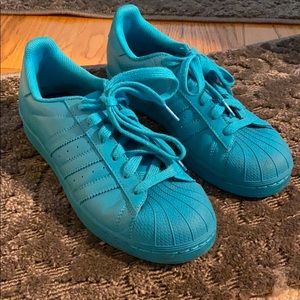 Adidas pharell teal superstars